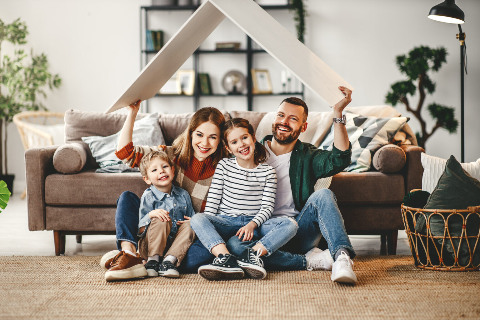 concept housing a young family. mother father and children in  new home