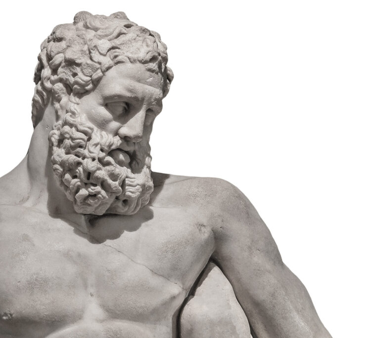 Ancient Greek statue of powerful Hercules, or Heracles, closeup, isolated at white background. Concept fitness, health and sport.